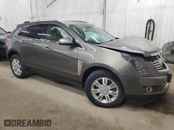2014 Cadillac SRX Luxury Collection z VIN 3GYFNEE34ES652268, wystawiony jako Copart lot #54136545 z przebiegiem 99 542 mil mil oraz Szkoda całkowita • Salvage title. Historia ofert i sprzedaży dostępna na DreamBid. Obrazek 4.