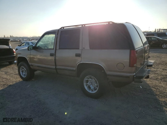 1996 Chevrolet Tahoe with VIN 1GNEK13R2TJ354351, listed as a Copart auction lot 43276385 with 2,526,567 mi miles and Salvage Title. Bid and sale history available at carsss.com. Image 2.