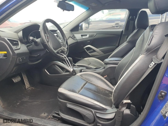2014 Hyundai Veloster Turbo with VIN KMHTC6AE8EU183497, listed as a Copart auction lot 62950724 with 123,751 mi miles and Clean Title. Bid and sale history available at carsss.com. Image 7.
