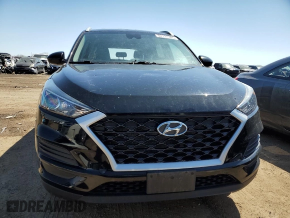 2019 Hyundai Tucson Value with VIN KM8J33A43KU888877, listed as a Copart auction lot 52191305 with 77,204 mi miles and Salvage title. Bid and sale history available at DreamBid. Image 5.