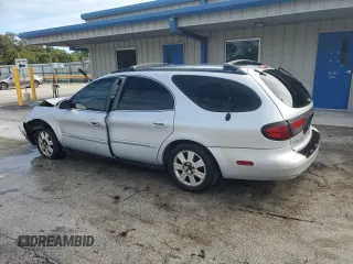 2003 Ford Taurus z VIN 1FAHP59U73A217826, wystawiony jako Copart lot #80059964 z przebiegiem 315 560 mil mil oraz Szkody całkowita. Historia ofert i sprzedaży dostępna na DreamBid. Obrazek 2.