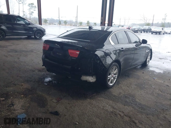 2017 Jaguar XE 25t Premium with VIN SAJAD4BG7HA966895, listed as a IAAI auction lot 41288998 with 158,391 mi miles. Bid and sale history available at carsss.com. Image 4.