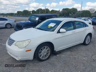 2007 Chrysler Sebring Touring with VIN 1C3LC56K37N533469, listed as a IAAI auction lot 42001566 with 187,698 mi miles and . Bid and sale history available at DreamBid. Image 2.
