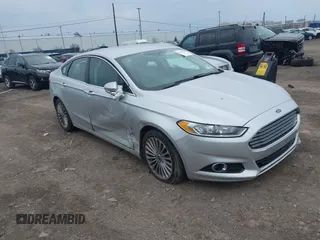 2016 Ford Fusion Titanium with VIN 3FA6P0K93GR117587, listed as a IAAI auction lot 42079701 with 142,105 mi miles. Bid and sale history available at carsss.com. Image 1.