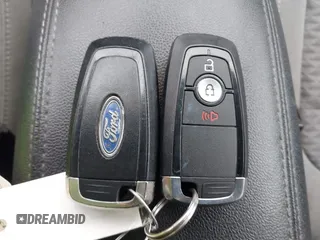 2020 Ford Escape SE z VIN 1FMCU9G66LUC32126, wystawiony jako IAAI lot #42313650 z przebiegiem 104 550 mil mil oraz . Historia ofert i sprzedaży dostępna na DreamBid. Obrazek 11.
