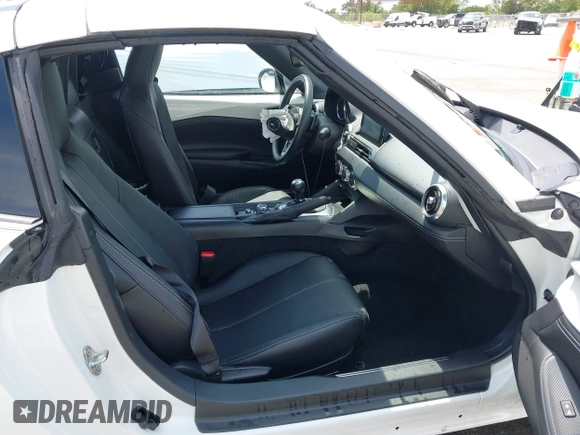 2023 Mazda MX-5 Miata Grand Touring с VIN JM1NDAM71P0560062, выставлен на аукционе IAAI как лот 42065123 с пробегом 11 320 миль миль и . История ставок и продаж доступна на DreamBid. Изображение 5.