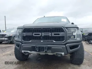 2020 Ford F-150 Raptor with VIN 1FTFW1RG0LFB66566, listed as a IAAI auction lot 41306076 with 92,596 mi miles and . Bid and sale history available at carsss.com. Image 6.