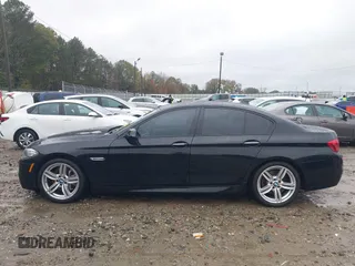 2015 BMW 5 Series 550i with VIN WBAKN9C52FD961297, listed as a IAAI auction lot 40863859 with 76,102 mi miles and . Bid and sale history available at DreamBid. Image 14.