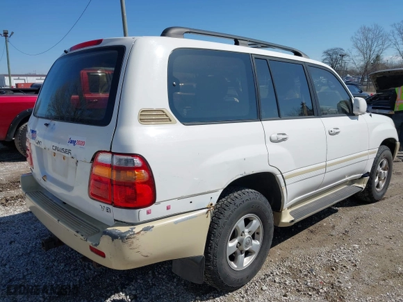 2000 Toyota Land Cruiser with VIN JT3HT05J5Y0126396, listed as a IAAI auction lot 41986185 with 201,156 mi miles. Bid and sale history available at carsss.com. Image 4.