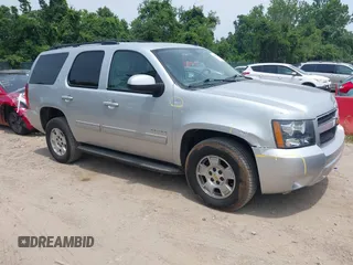 2013 Chevrolet Tahoe LT z VIN 1GNSCBE06DR320906, wystawiony jako IAAI lot #42505492 z przebiegiem 161 162 mil mil oraz . Historia ofert i sprzedaży dostępna na DreamBid. Obrazek 1.