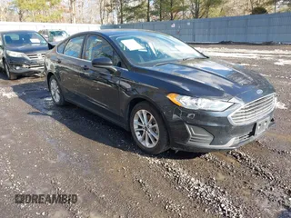 2020 Ford Fusion SE z VIN 3FA6P0LU4LR158954, wystawiony jako IAAI lot #41474425 z przebiegiem 76 966 mil mil oraz . Historia ofert i sprzedaży dostępna na DreamBid. Obrazek 1.