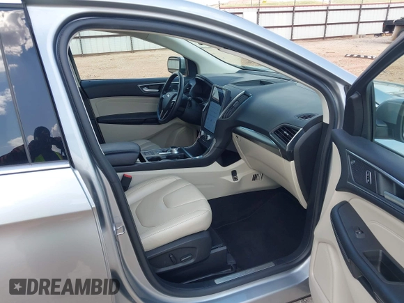 2022 Ford Edge Titanium with VIN 2FMPK4K99NBB06136, listed as a IAAI auction lot 42733977 with 57,794 mi miles and . Bid and sale history available at DreamBid. Image 5.