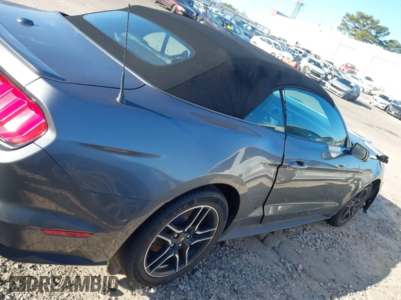 2021 Ford Mustang EcoBoost z VIN 1FATP8UH3M5105279, wystawiony jako IAAI lot #41712821 z przebiegiem 99 760 mil mil oraz . Historia ofert i sprzedaży dostępna na DreamBid. Obrazek 13.