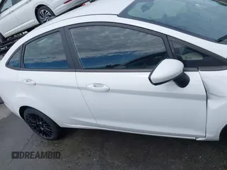 2019 Ford Fiesta SE z VIN 3FADP4BJ2KM143337, wystawiony jako IAAI lot #42179937 z przebiegiem 124 078 mil mil oraz . Historia ofert i sprzedaży dostępna na DreamBid. Obrazek 13.