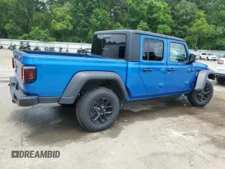 2023 Jeep Gladiator Sport S with VIN 1C6HJTAG3PL593284, listed as a Copart auction lot 57292935 with Not provided miles and Salvage title. Bid and sale history available at DreamBid. Image 3.