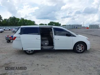 2011 Honda Odyssey EX-L with VIN 5FNRL5H67BB011070, listed as a IAAI auction lot 42491685 with 200,671 mi miles and . Bid and sale history available at DreamBid. Image 13.