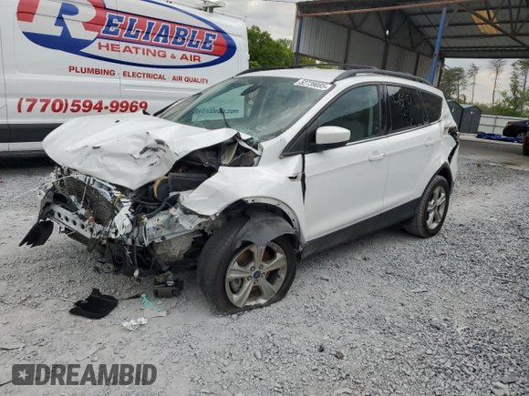 2014 Ford Escape SE z VIN 1FMCU9GX2EUC85787, wystawiony jako Copart lot #52739085 z przebiegiem 123 641 mil mil oraz Szkoda całkowita • Salvage title. Historia ofert i sprzedaży dostępna na DreamBid. Obrazek 1.