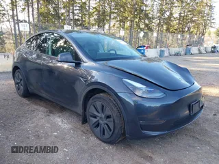 2024 Tesla Model Y Long Range z VIN 7SAYGDEE1RF120899, wystawiony jako IAAI lot #41698883 z przebiegiem 6 090 mil mil oraz . Historia ofert i sprzedaży dostępna na DreamBid. Obrazek 1.