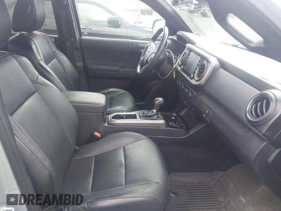2021 Toyota Tacoma SR with VIN 5TFCZ5AN3MX258746, listed as a IAAI auction lot 42252967 with 62,095 mi miles and . Bid and sale history available at DreamBid. Image 5.