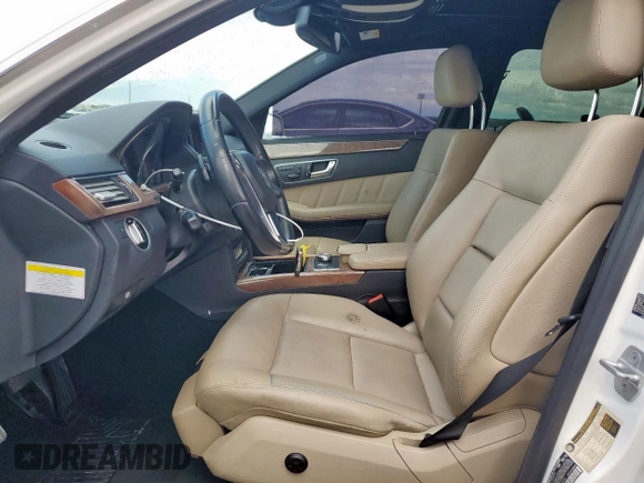 2013 Mercedes-Benz E 350 Luxury with VIN WDDHF5KB3DA705006, listed as a Copart auction lot 50730045 with 128,540 mi miles and Salvage title. Bid and sale history available at DreamBid. Image 7.
