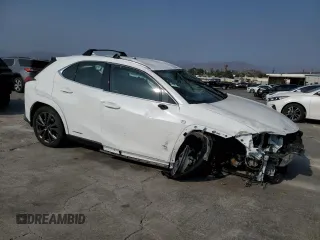 2022 Lexus UX 250h F Sport with VIN JTHE9JBHXN2057983, listed as a Copart auction lot 71456654 with 27,367 mi miles and Salvage Title. Bid and sale history available at DreamBid. Image 4.