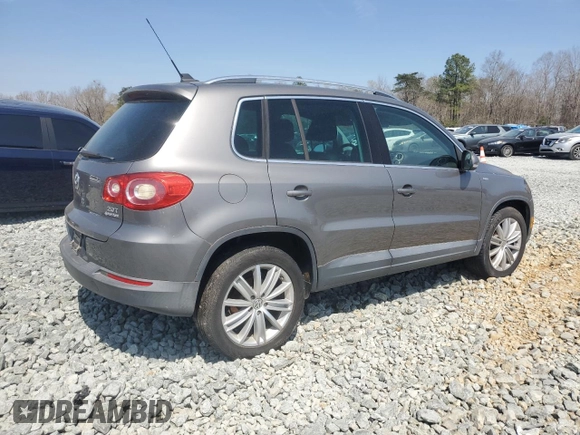 2010 Volkswagen Tiguan SEL with VIN WVGBV7AX4AW513809, listed as a Copart auction lot 50951415 with 109,001 mi miles and Clean Title. Bid and sale history available at DreamBid. Image 3.