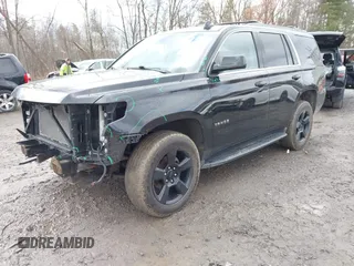 2018 Chevrolet Tahoe LT z VIN 1GNSKBKC7JR276427, wystawiony jako IAAI lot #41977418 z przebiegiem 152 007 mil mil oraz . Historia ofert i sprzedaży dostępna na DreamBid. Obrazek 2.