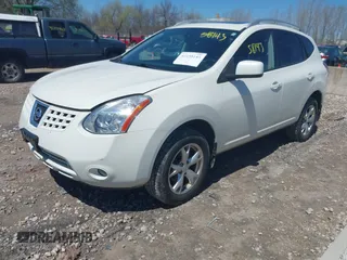 2009 Nissan Rogue S with VIN JN8AS58V29W440702, listed as a IAAI auction lot 42158143 with 311,180 mi miles. Bid and sale history available at carsss.com. Image 2.