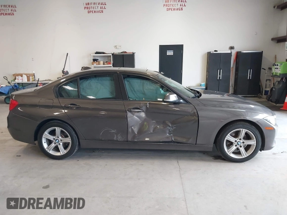 2015 BMW 3 Series 328i with VIN WBA3A5C57FF609734, listed as a IAAI auction lot 41392336 with 121,378 mi miles. Bid and sale history available at carsss.com. Image 13.