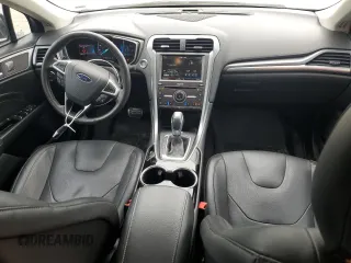 2016 Ford Fusion Titanium with VIN 3FA6P0D90GR232029, listed as a Copart auction lot 57096045 with 90,694 mi miles and Salvage title. Bid and sale history available at DreamBid. Image 8.