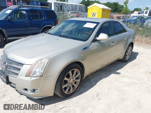 2008 Cadillac CTS RWD with VIN 1G6DF577X80208661, listed as a IAAI auction lot 42520115 with 104,756 mi miles and . Bid and sale history available at DreamBid. Image 2.