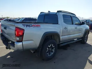 2018 Toyota Tacoma SR with VIN 3TMCZ5AN1JM141605, listed as a IAAI auction lot 41558201 with 91,855 mi miles. Bid and sale history available at carsss.com. Image 4.