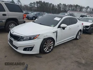 2015 Kia Optima SX Turbo with VIN 5XXGR4A63FG468701, listed as a IAAI auction lot 41789169 with 112,732 mi miles. Bid and sale history available at carsss.com. Image 2.