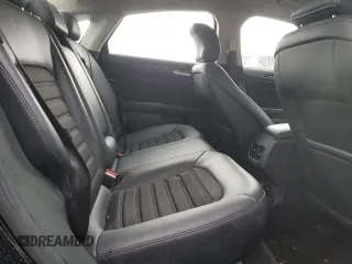 2018 Ford Fusion SE z VIN 3FA6P0LU9JR185726, wystawiony jako Copart lot #55471585 z przebiegiem 76 651 mil mil oraz Szkoda całkowita • Salvage title. Historia ofert i sprzedaży dostępna na DreamBid. Obrazek 10.