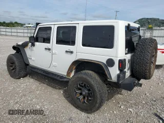 2014 Jeep Wrangler Unlimited Sahara z VIN 1C4BJWEG9EL102336, wystawiony jako Copart lot #55391335 z przebiegiem Nie podano mil oraz Szkoda całkowita • Salvage title. Historia ofert i sprzedaży dostępna na DreamBid. Obrazek 2.