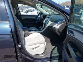 2015 Cadillac SRX with VIN 3GYFNAE39FS571065, listed as a IAAI auction lot 42029749 with 146,098 mi miles and . Bid and sale history available at DreamBid. Image 5.