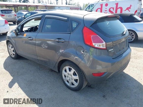 2015 Ford Fiesta SE with VIN 3FADP4EE1FM195949, listed as a IAAI auction lot 42122089 with Not Provided miles. Bid and sale history available at carsss.com. Image 3.