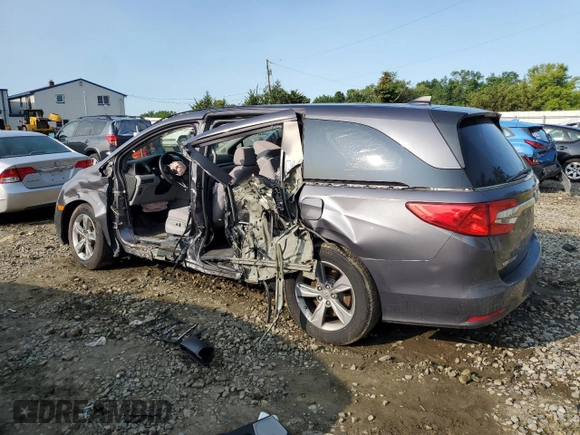 2019 Honda Odyssey EX with VIN 5FNRL6H58KB013889, listed as a Copart auction lot 57077025 with 126,467 mi miles and Salvage title. Bid and sale history available at DreamBid. Image 2.