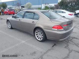 2004 BMW 7 Series 745Li with VIN WBAGN63494DS45716, listed as a IAAI auction lot 41906522 with 127,292 mi miles. Bid and sale history available at carsss.com. Image 3.