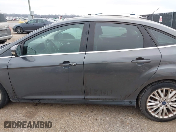 2018 Ford Focus Titanium with VIN 1FADP3J29JL232911, listed as a IAAI auction lot 41524078 with 90,764 mi miles and . Bid and sale history available at DreamBid. Image 14.