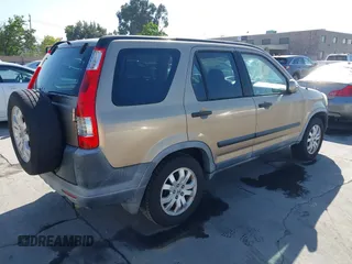 2005 Honda CR-V EX with VIN JHLRD78895C026877, listed as a IAAI auction lot 42129376 with 164,543 mi miles. Bid and sale history available at carsss.com. Image 4.