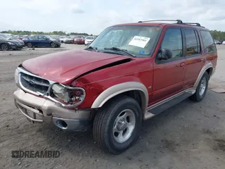 1999 Ford Explorer XLT z VIN 1FMZU35P4XUA38932, wystawiony jako IAAI lot #41953981 z przebiegiem 117 876 mil mil oraz . Historia ofert i sprzedaży dostępna na DreamBid. Obrazek 2.