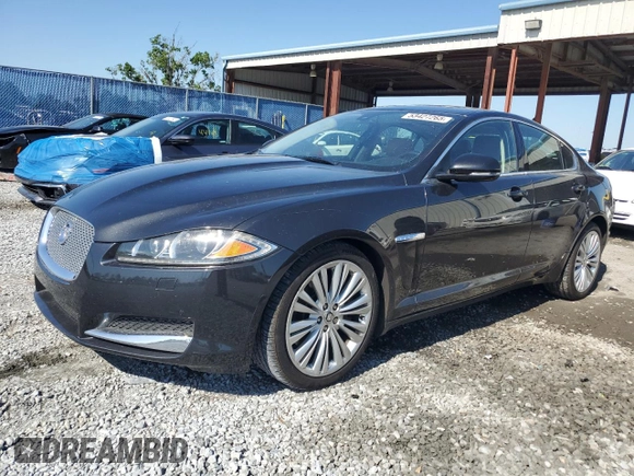 2012 Jaguar XF Portfolio with VIN SAJWA0HB4CLS35664, listed as a Copart auction lot 53427265 with 98,731 mi miles and Salvage Title. Bid and sale history available at carsss.com. Image 1.