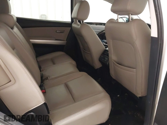 2014 Mazda CX-9 Grand Touring with VIN JM3TB3DA7E0428187, listed as a IAAI auction lot 41247569 with 117,590 mi miles and . Bid and sale history available at DreamBid. Image 8.