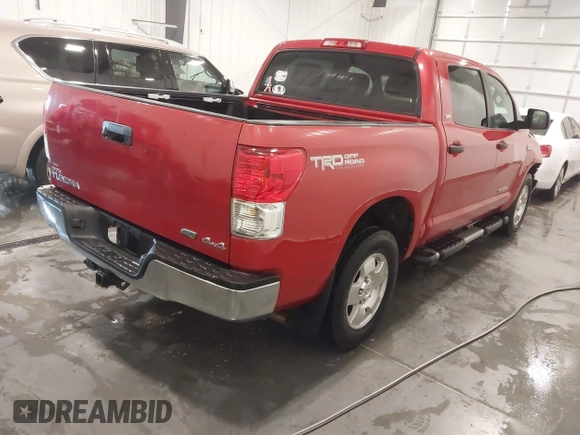 2011 Toyota Tundra 4WD Truck with VIN 5TFDW5F12BX178046, listed as a IAAI auction lot 41619191 with 186,866 mi miles. Bid and sale history available at carsss.com. Image 4.
