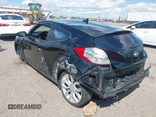 2013 Hyundai Veloster w/Gray Int with VIN KMHTC6AD1DU154946, listed as a IAAI auction lot 42375871 with 108,095 mi miles and . Bid and sale history available at DreamBid. Image 3.