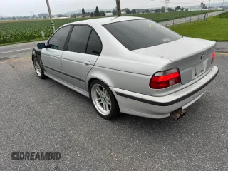 1999 BMW 5 Series 540i z VIN WBADN5333XGC91598, wystawiony jako Copart lot #61690655 z przebiegiem 174 320 mil mil oraz Szkoda całkowita • Salvage title. Historia ofert i sprzedaży dostępna na DreamBid. Obrazek 3.