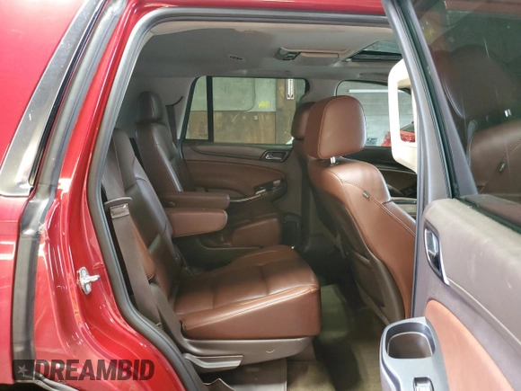 2015 Chevrolet Tahoe LTZ z VIN 1GNSKCKC4FR277564, wystawiony jako Copart lot #60589335 z przebiegiem Nie podano mil oraz Szkoda całkowita • Salvage title. Historia ofert i sprzedaży dostępna na DreamBid. Obrazek 11.
