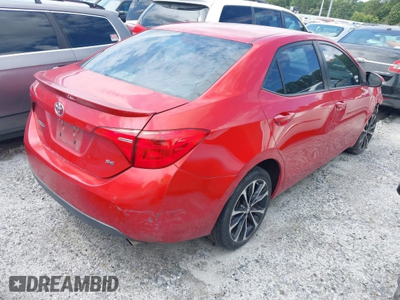 2017 Toyota Corolla L with VIN 2T1BURHE7HC812110, listed as a IAAI auction lot 42580694 with 122,516 mi miles and . Bid and sale history available at DreamBid. Image 4.
