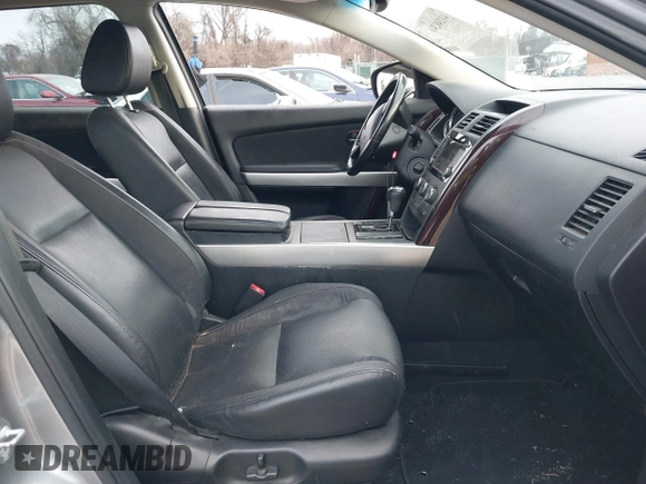 2013 Mazda CX-9 Grand Touring z VIN JM3TB3DV1D0401102, wystawiony jako IAAI lot #41248346 z przebiegiem 122 555 mil mil oraz . Historia ofert i sprzedaży dostępna na DreamBid. Obrazek 5.